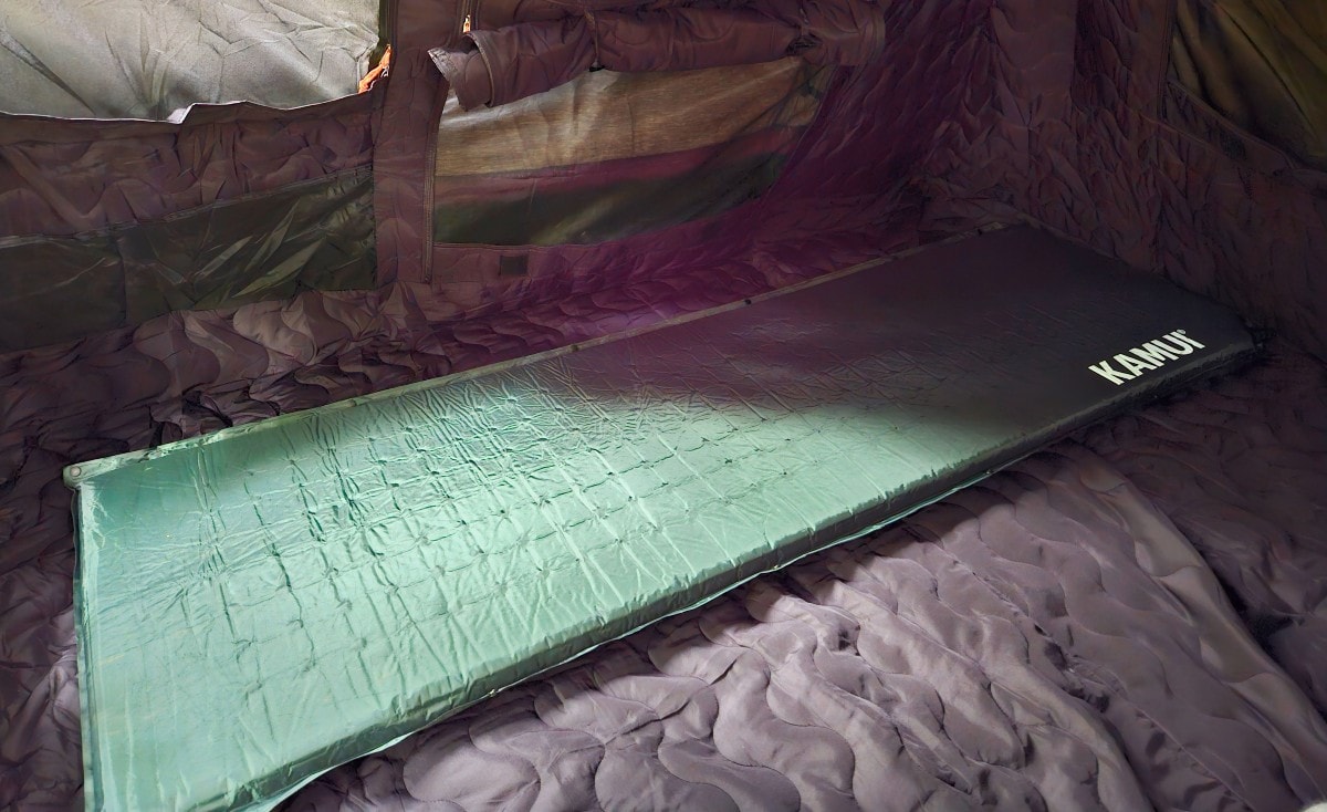 The kamui sleeping pad easily fits into camping tents