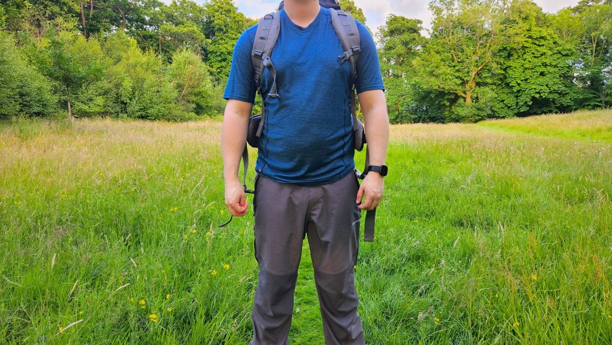 Me testing the breathability of the montane primino base layer on a hot day for our review.