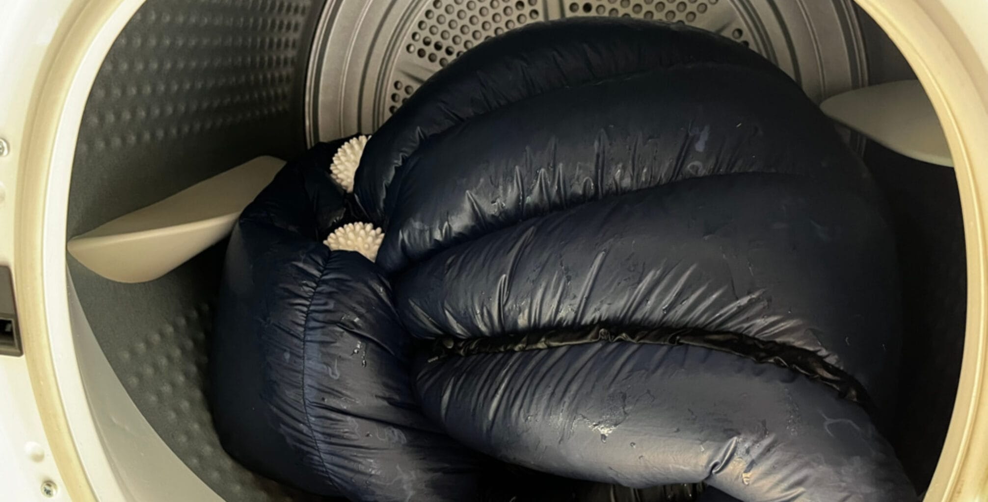 a down sleeping bag in a tumble dryer 