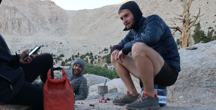 two campers sit next to a brs-3000t stove review on the pacific crest trail