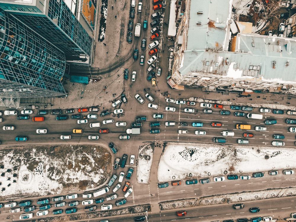 A birds-eye view of a busy traffic intersection