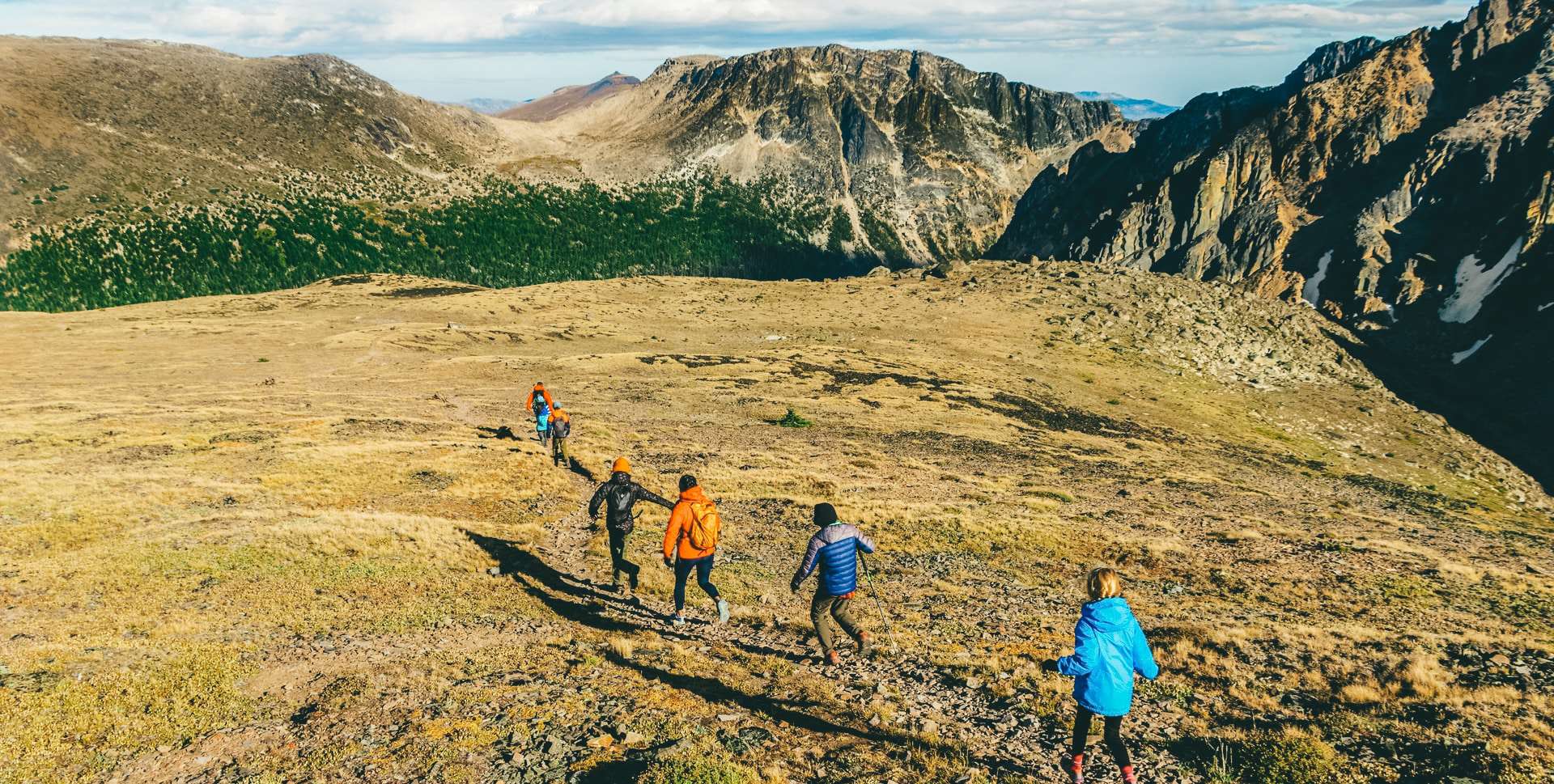 A family hiking through the hills