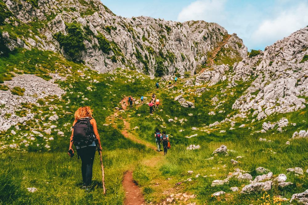 Hikers in the Basque Country take on a steep incline