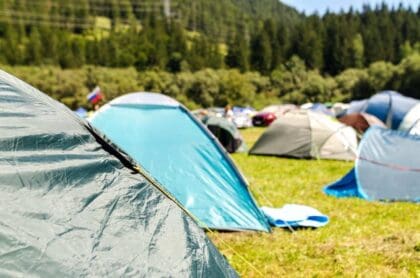 A wide variety of small tents populating a small campsite