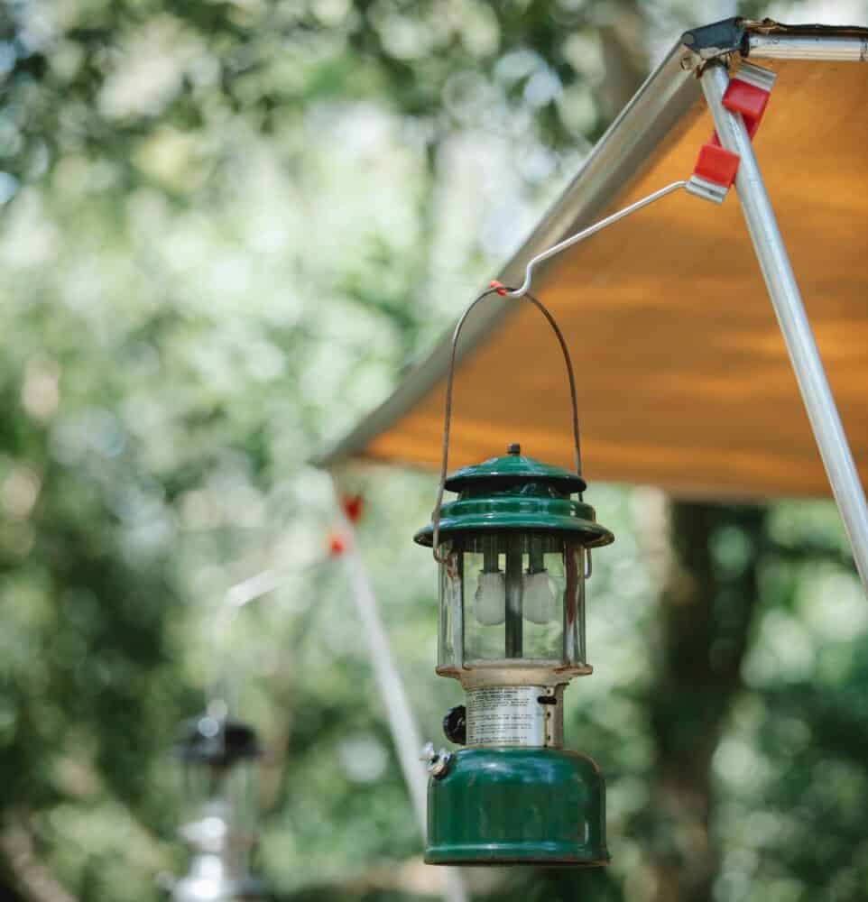 Lantern Hanging From Hook On Tarpaulin