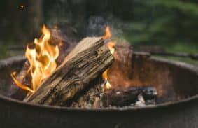 How to start a fire in a fire pit while camping or outdoors