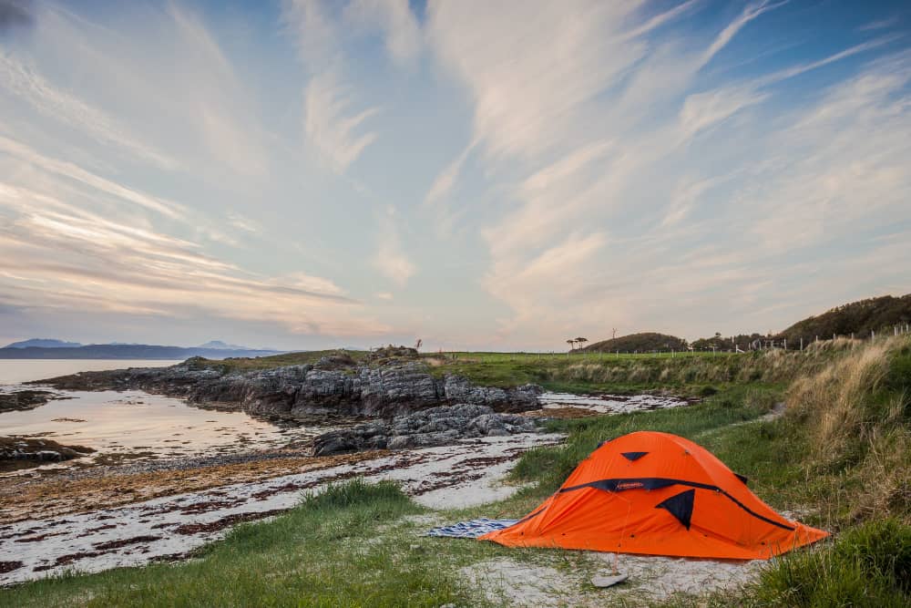 A bright coloured tent at the beach is easy to find but might get UV damage from the sun.  