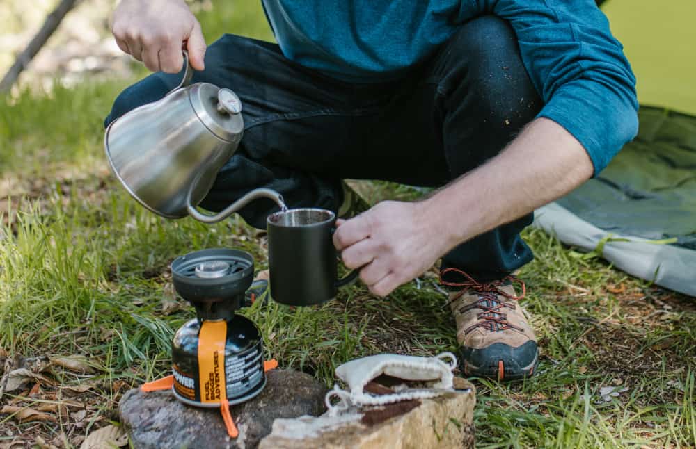 Jetboils can be used with other fuels to make hot drinks and cook food while camping in the woods. 