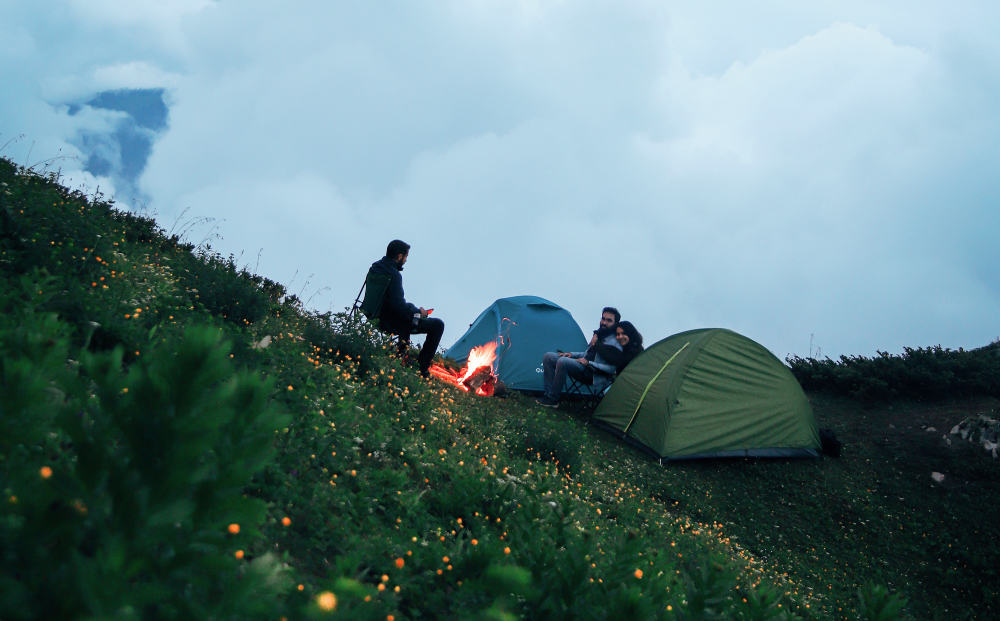 Tents and campfires go together as long as they aren't too close to each other. 