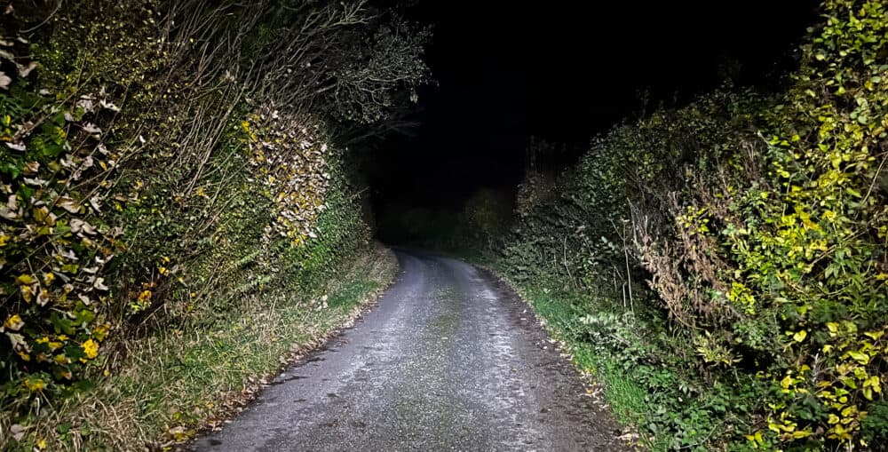Testing a hiking trail by lighting it up at night using the Nitecore headlamp.