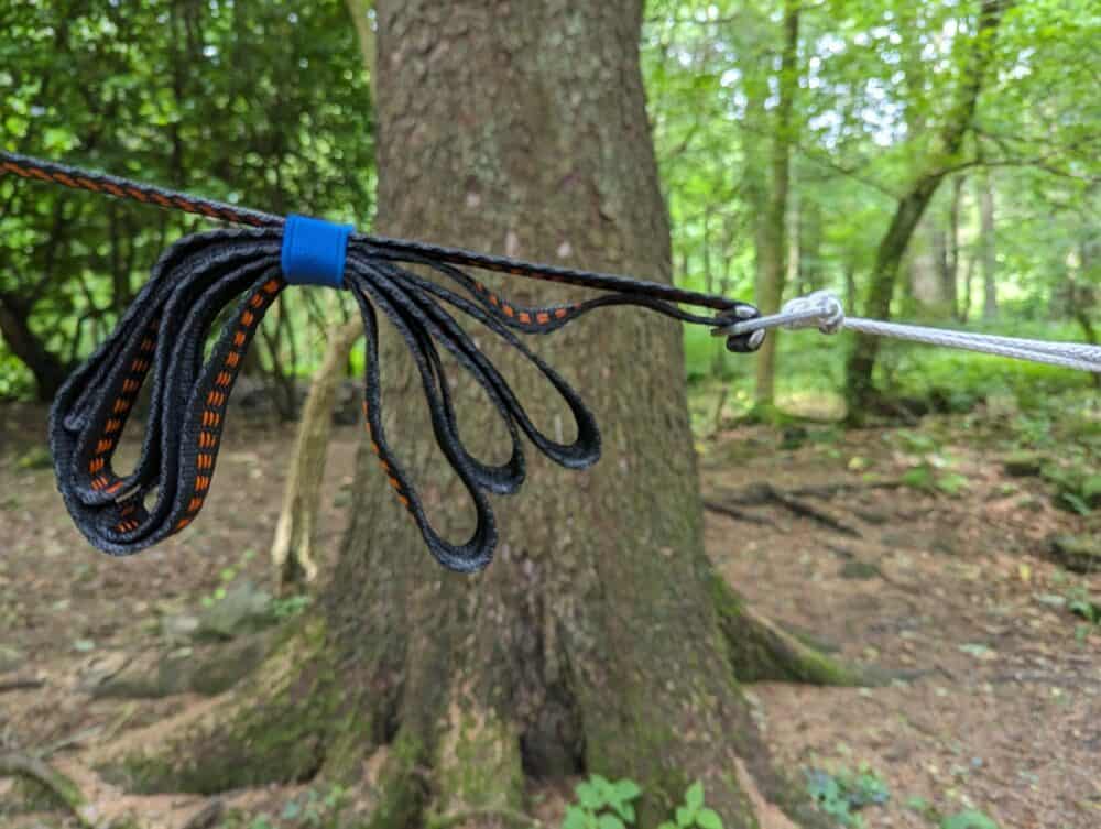 This ultralight hammock uses a tensioner for the setup